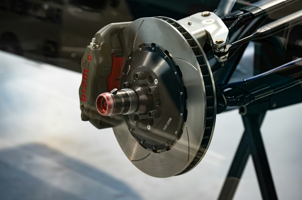 Close view of a car brake rotor and caliper