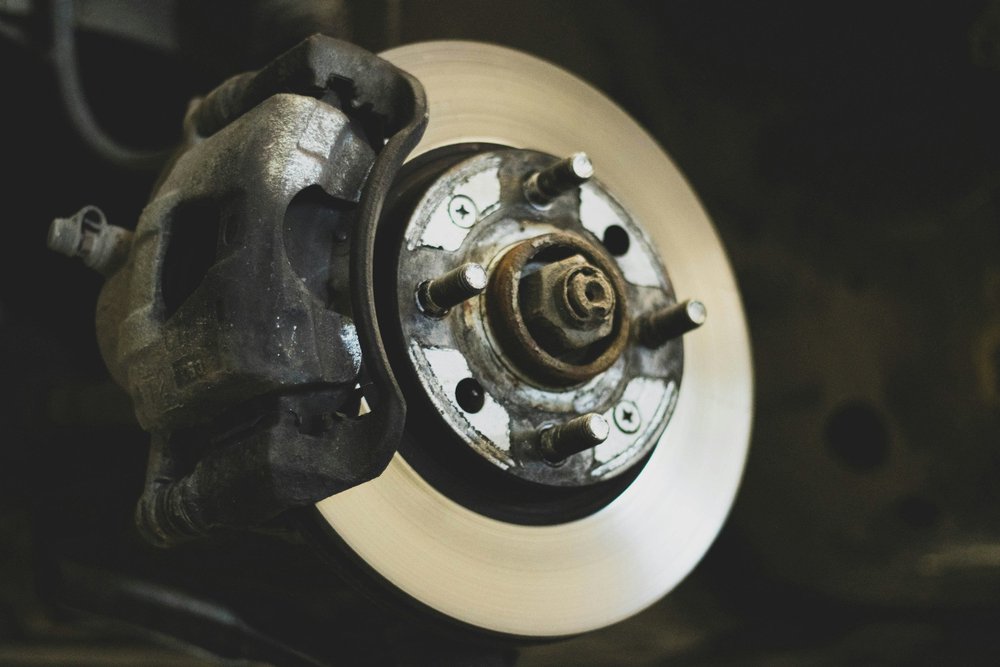 Car brake rotor and caliper with the wheel removed